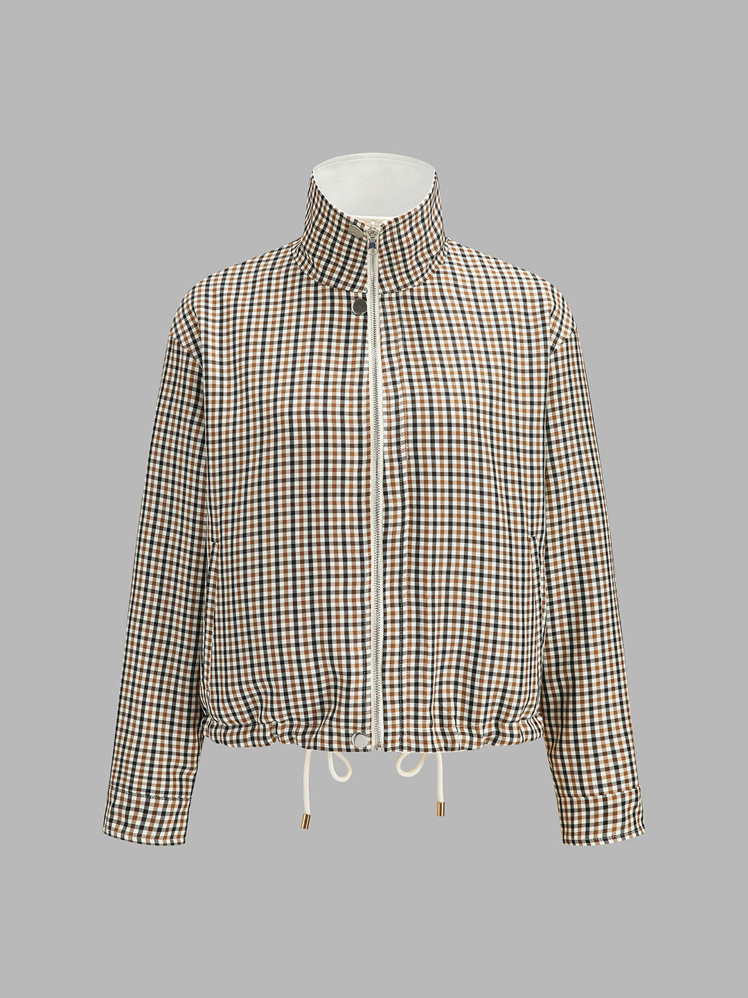 Check side of the reversible jacket flat on white, brown and beige windowpane pattern