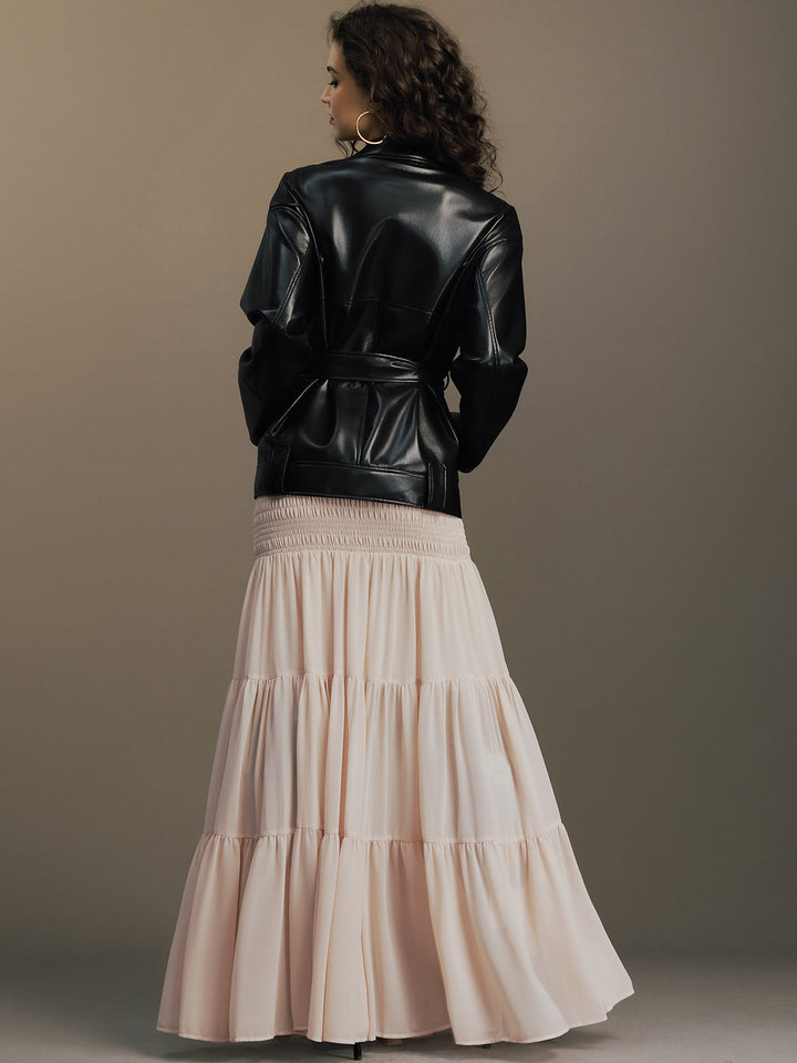 Rear styling shot of the short black leather jacket with cinched back belt