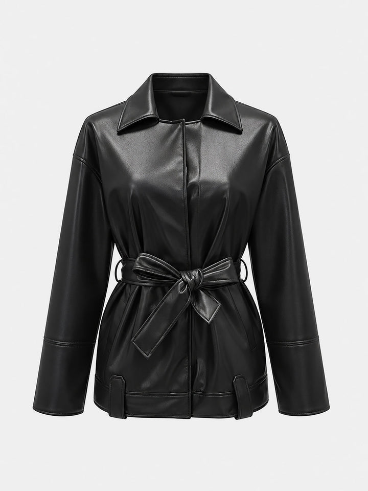 Front product shot of the black leather jacket with shirt collar and bow-tied belt