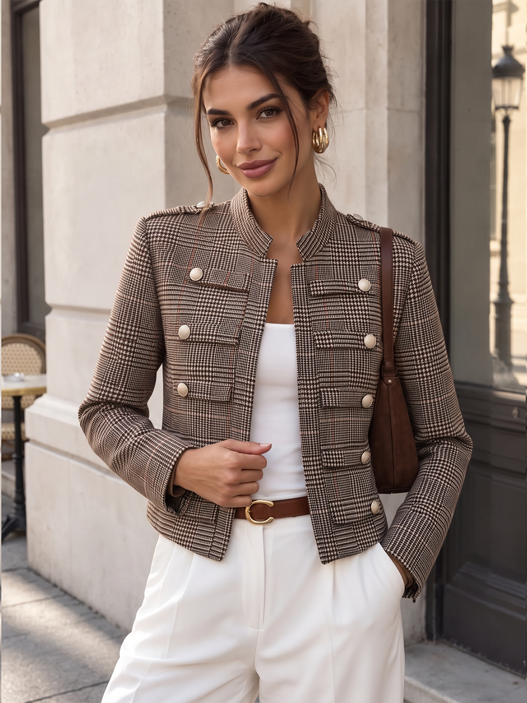 Taupe houndstooth military jacket with gold buttons and white wide-leg trousers