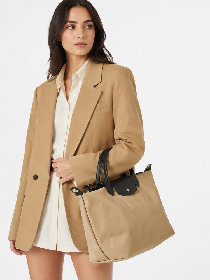 Longchamp Le Pliage Energy L Top Handle Crossbody Bag Clay Beige worn shoulder