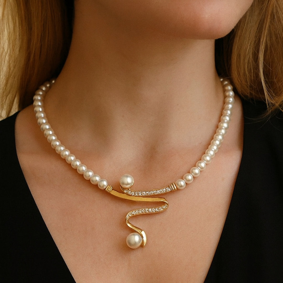 Close-up of the wave pendant design on the necklace