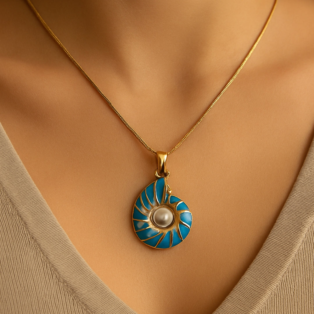 Seashell pearl necklace photographed beside a coastal styling backdrop