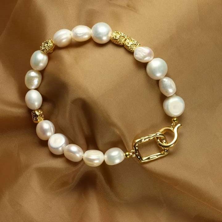 Elegant baroque pearl bracelet shown on a white background