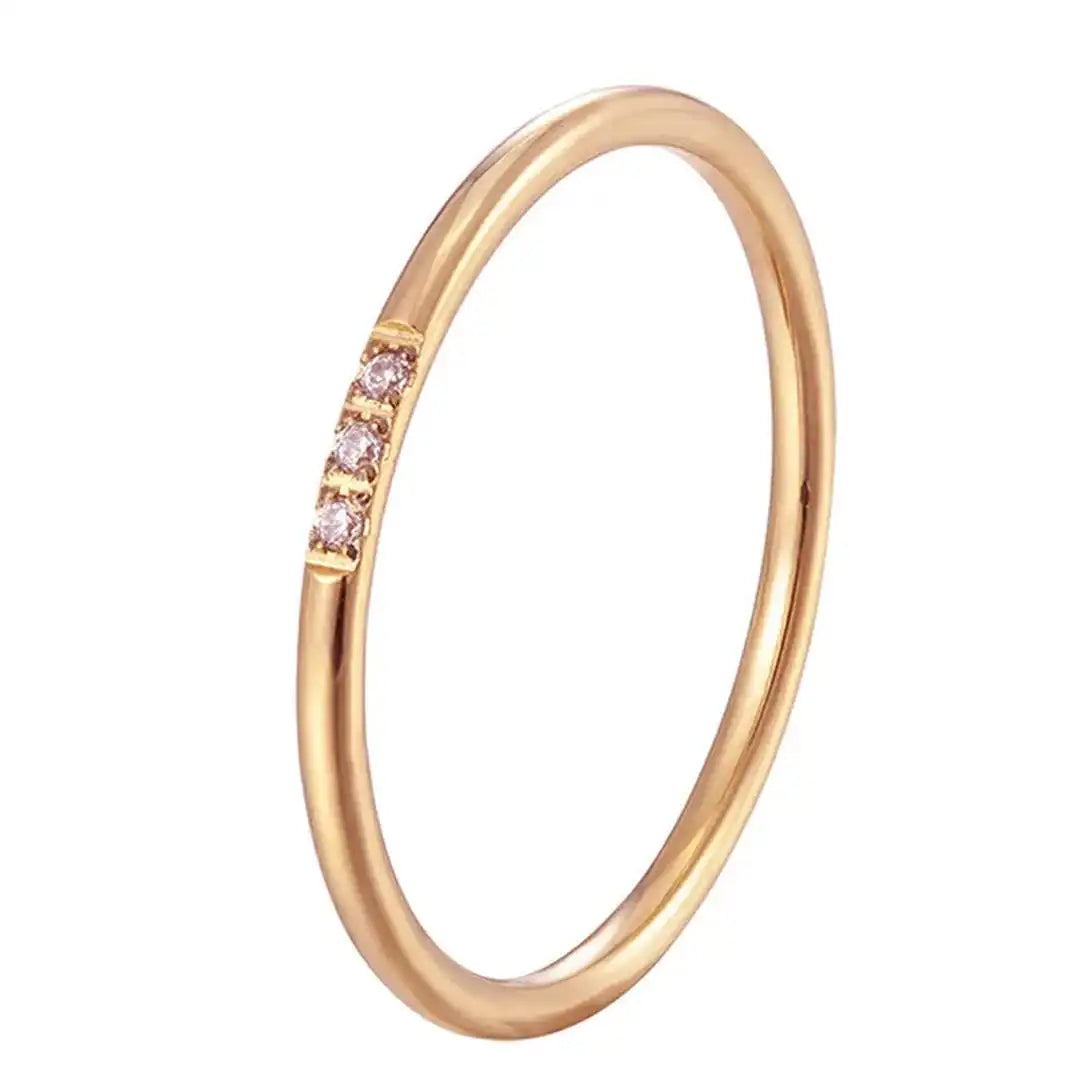 Ring stacked with other rings on a model's hand