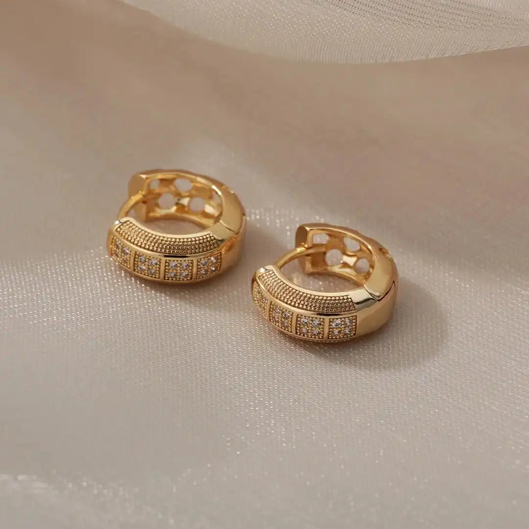 Earrings worn on a model's ear