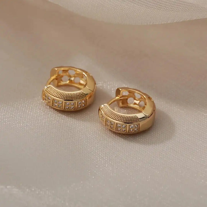 Earrings worn on a model's ear
