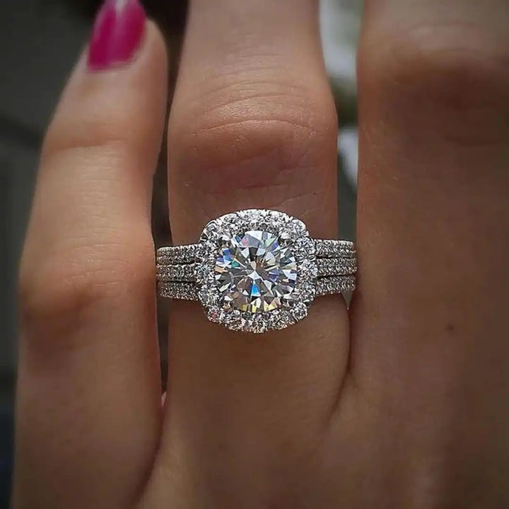 Main shot of the cushion halo pave statement ring