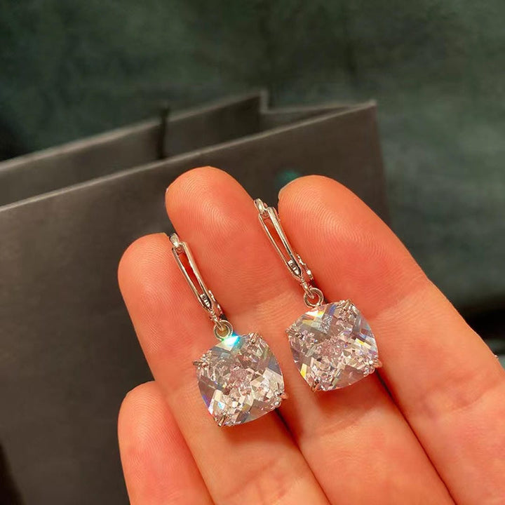Earrings worn on a model's ear