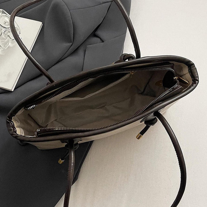 Espresso Muse Bag — women's bag, shown on the model