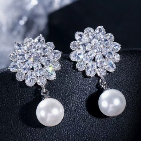 Main shot of the pearl blossom clip-on earrings