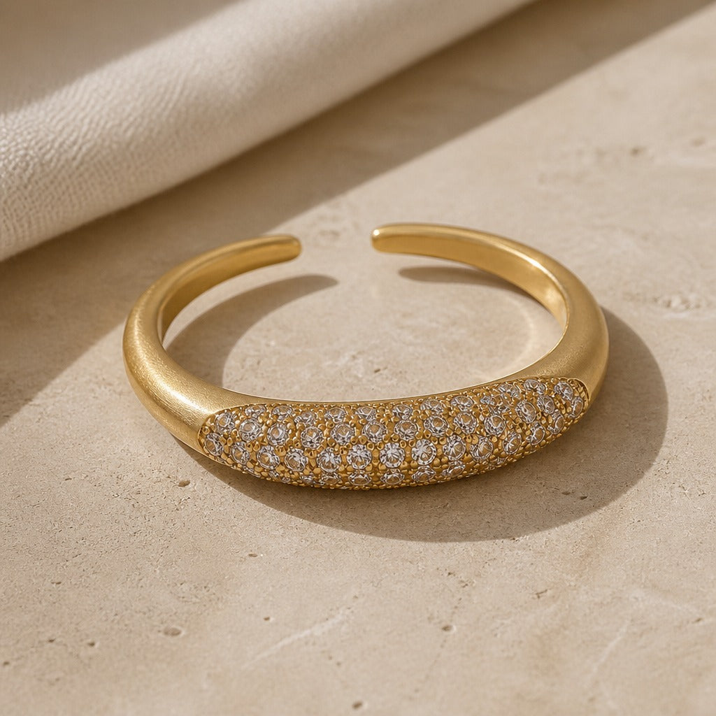 Main shot of the dainty gold zircon stacking ring