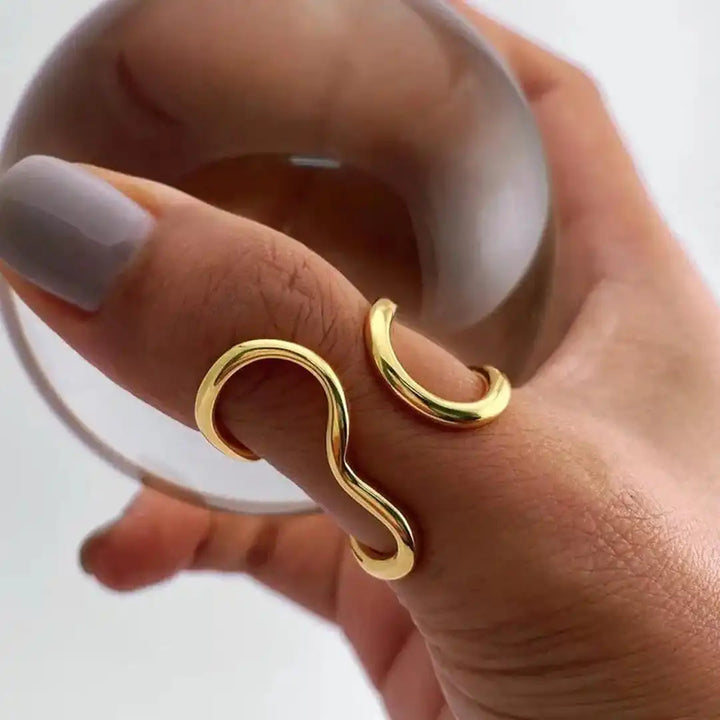 Main shot of the adjustable golden charm open ring