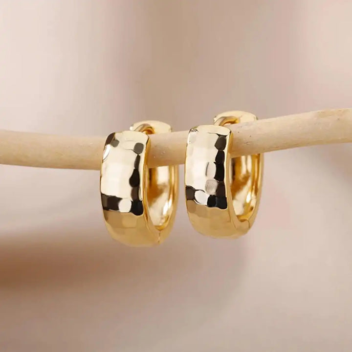 Main shot of the small gold hoop earrings