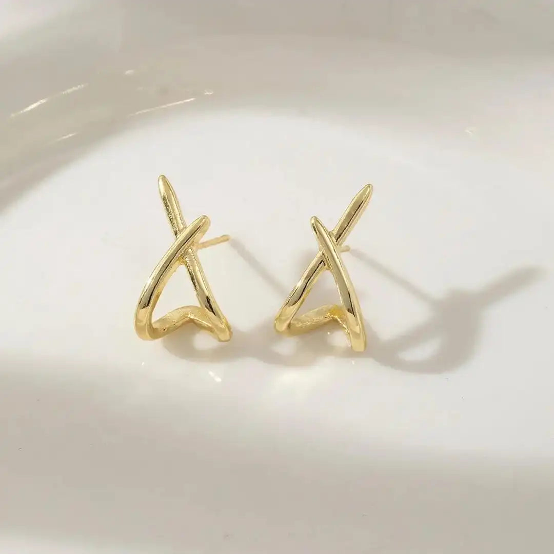 Earrings worn on a model's ear