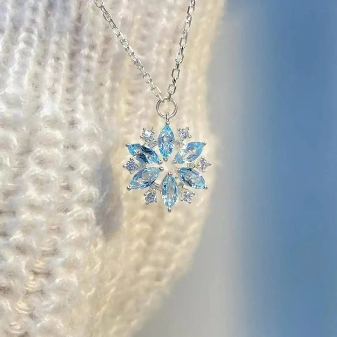 Main shot of the blue snowflake pendant necklace