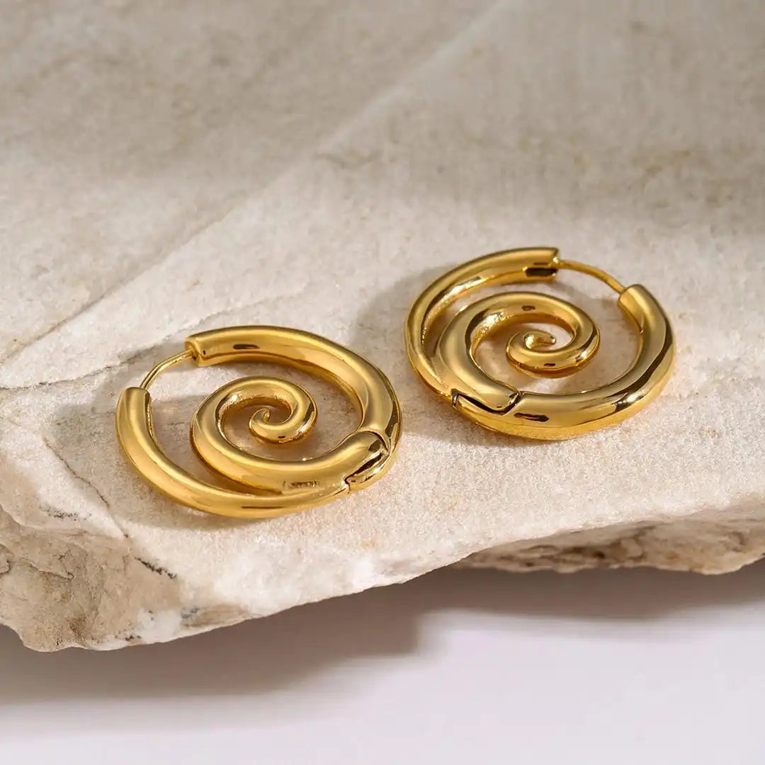 Earrings worn on a model's ear