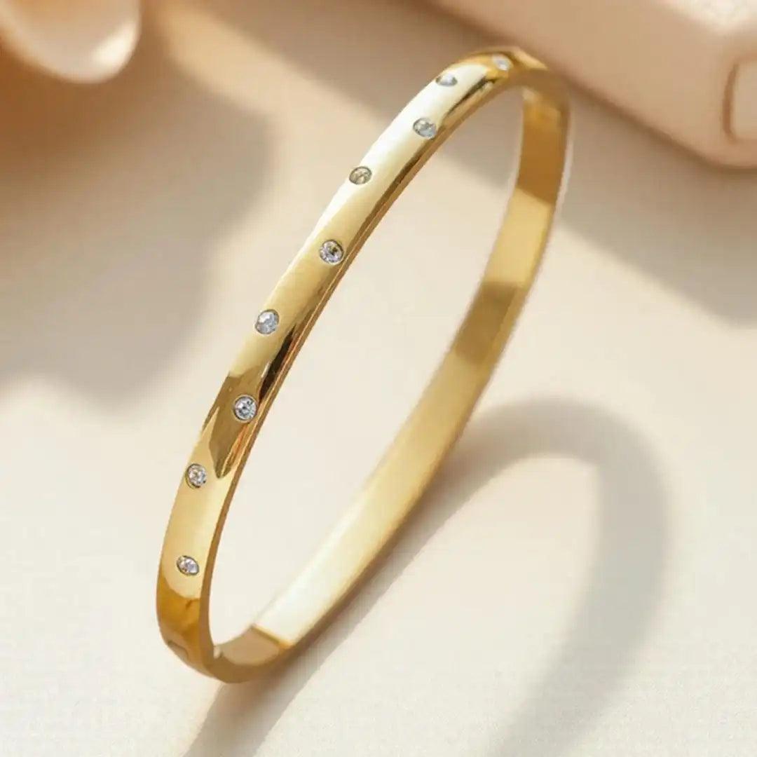 Main shot of the golden zirconia bangle bracelet