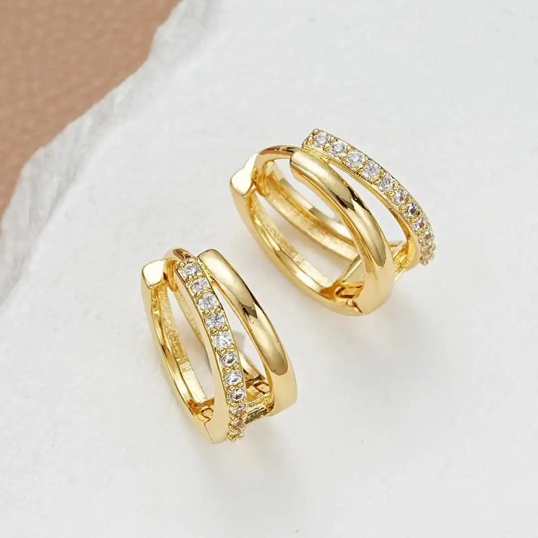 Earrings worn on a model's ear