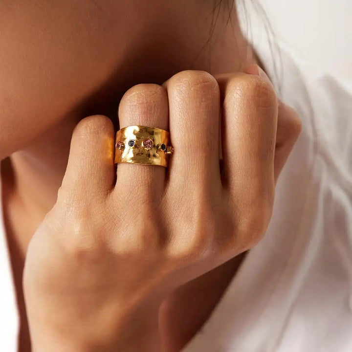 Ring worn on a model's hand