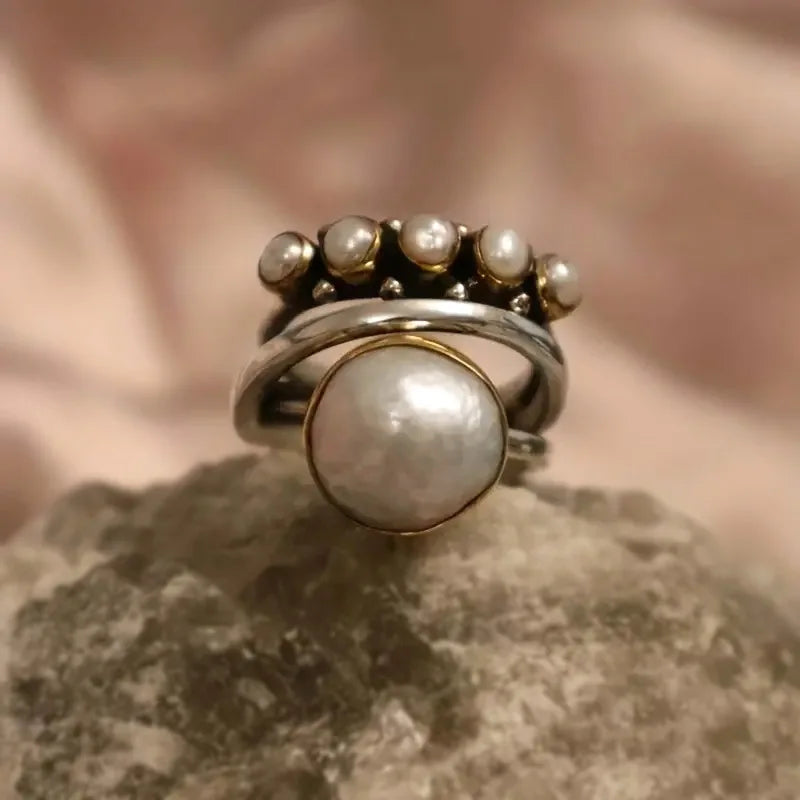 Layered pearl rings set photographed from a different angle