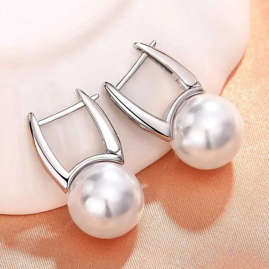 Main shot of the imitation pearl earrings