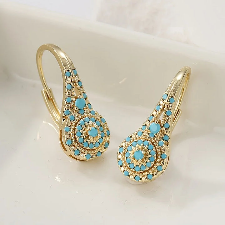 Pearl bloom earrings displayed in a jewellery box