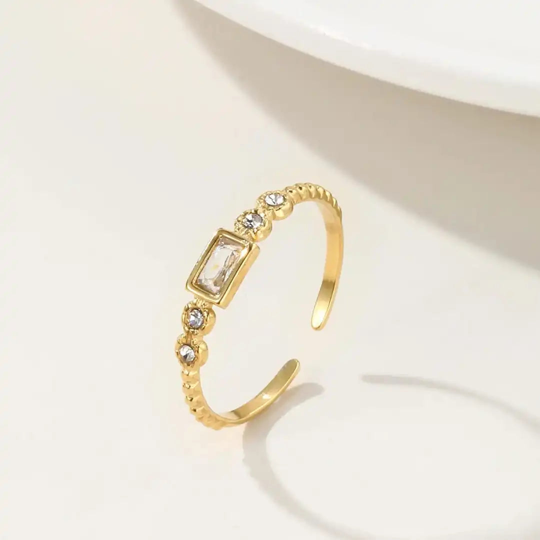 Main shot of the simple gold zircon open ring