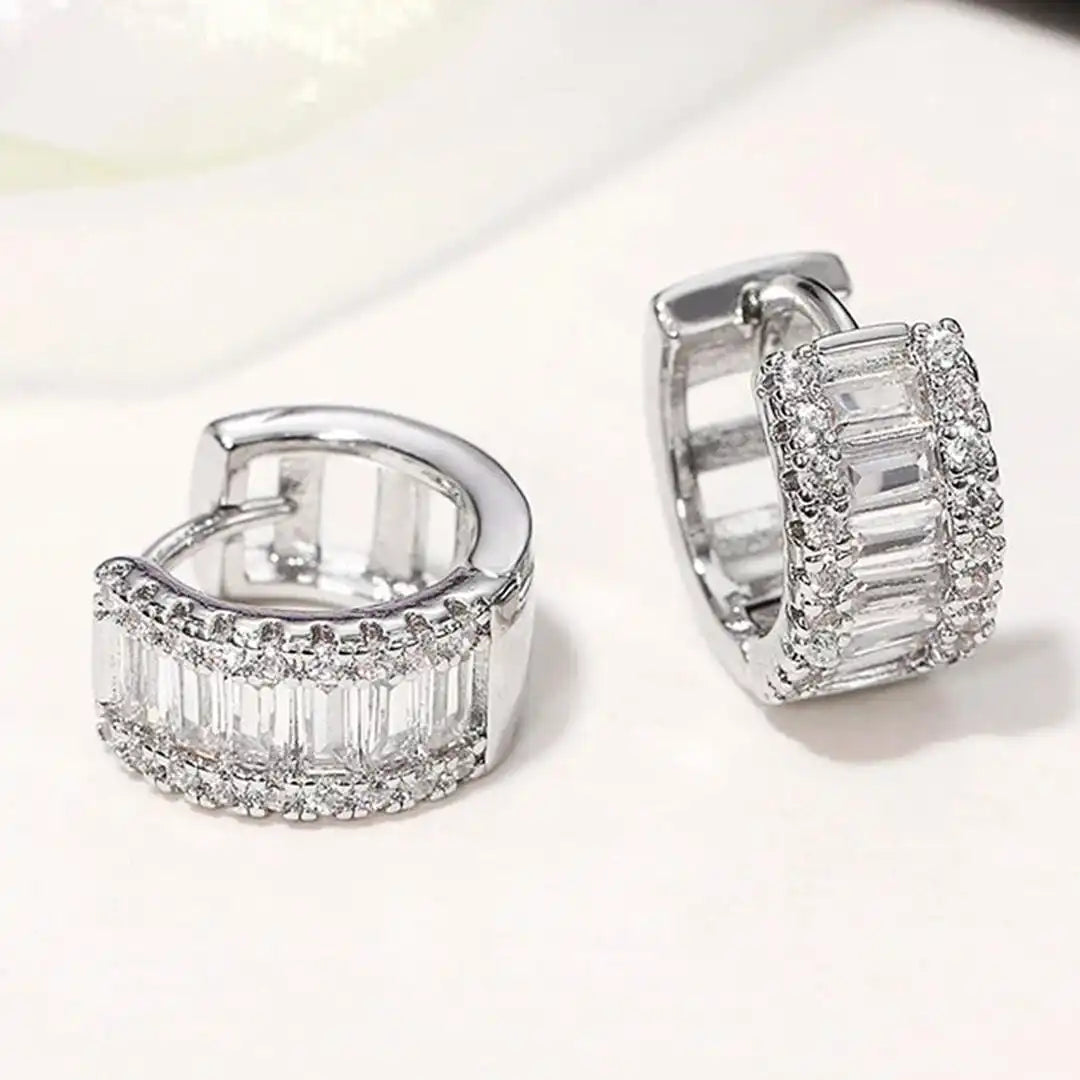 Earrings worn on a model's ear