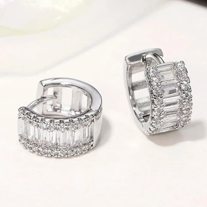 Earrings worn on a model's ear