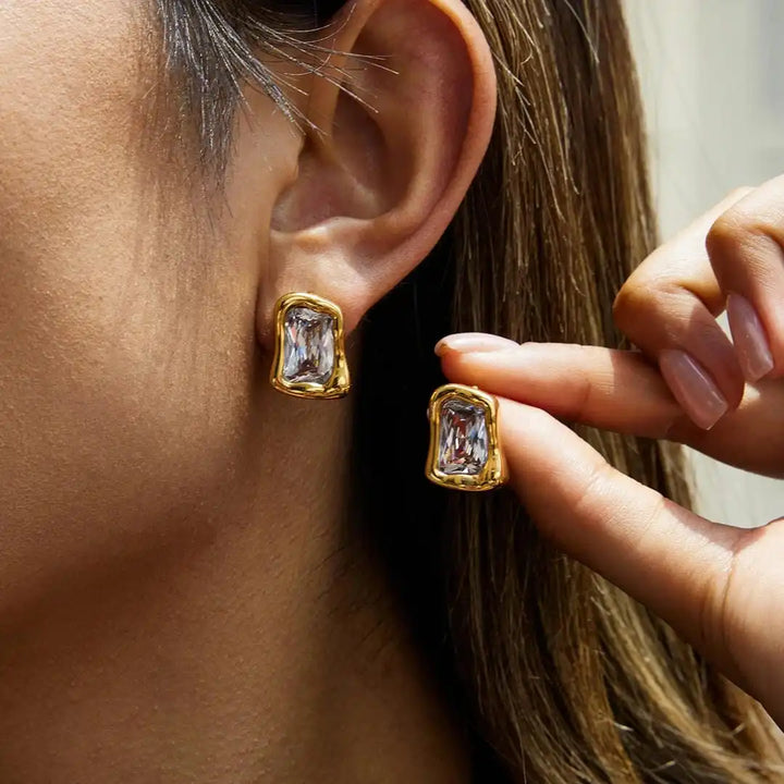 Main shot of the gold zircon square drop earrings