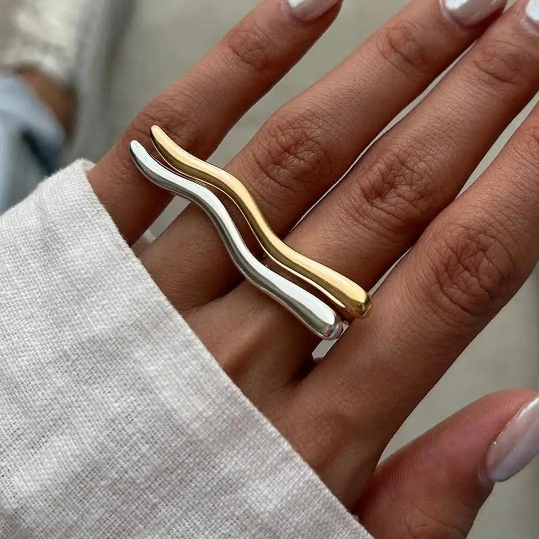Main shot of the minimalist golden twig ring