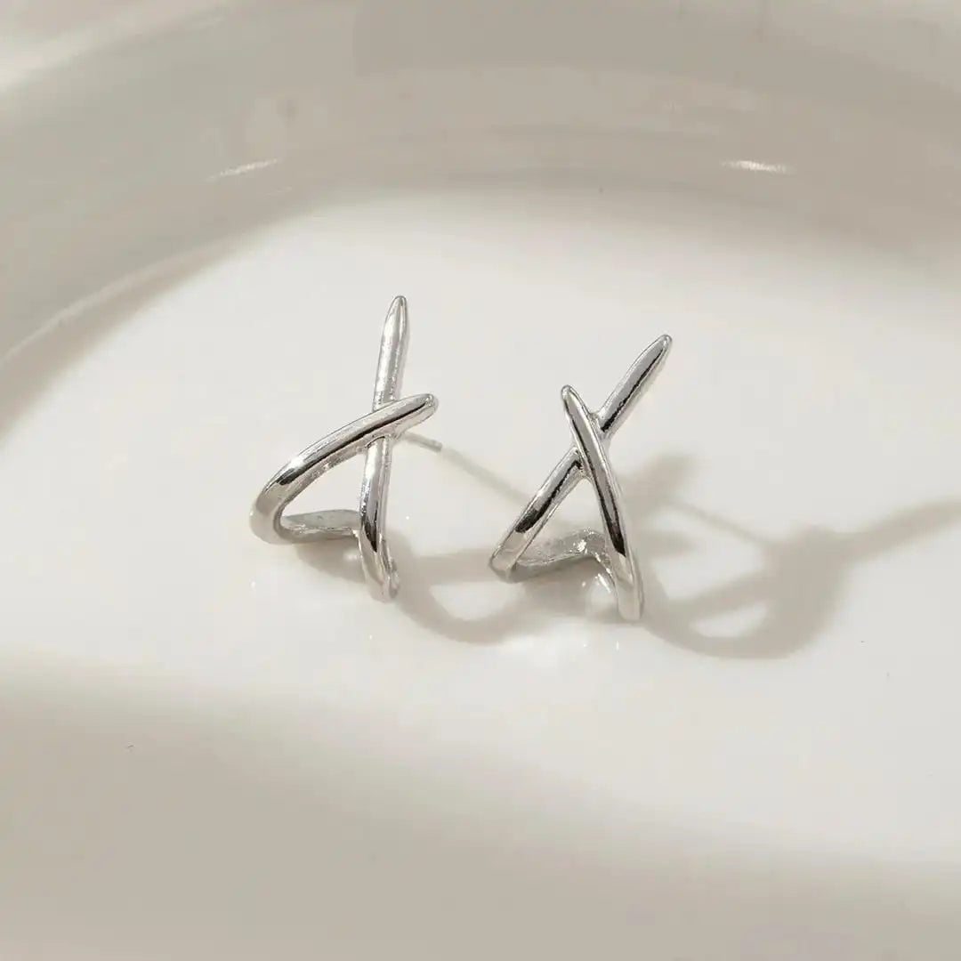 Both earrings displayed together on a jewellery tray