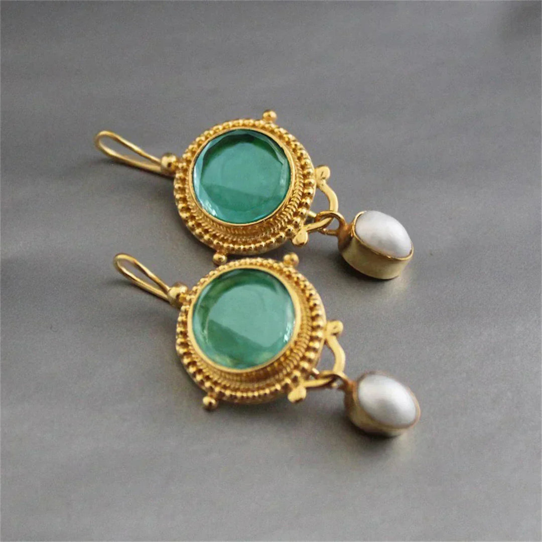 Cherished turquoise gem earrings shown on a white background