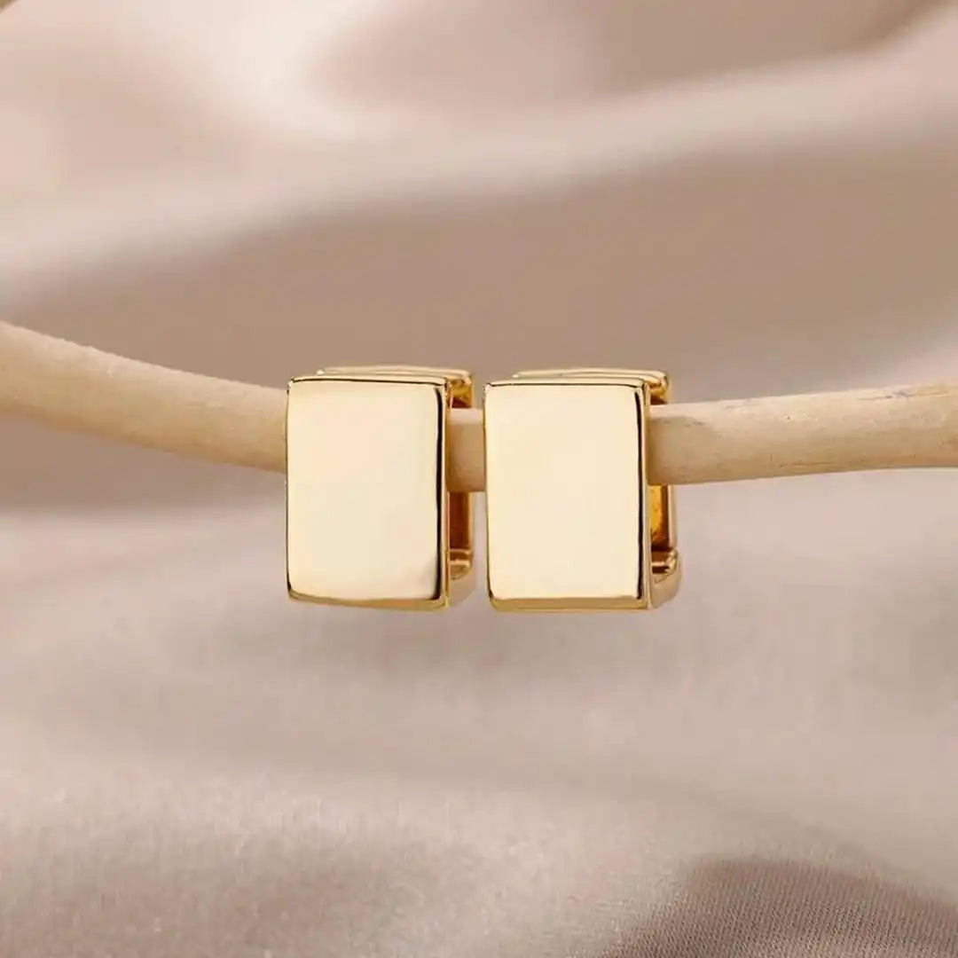 Earrings worn on a model's ear