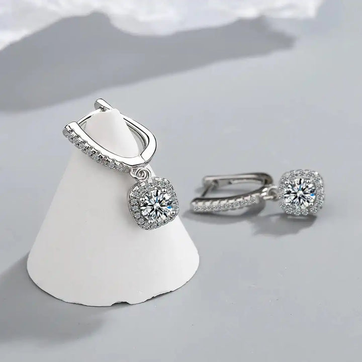 Earrings worn on a model's ear