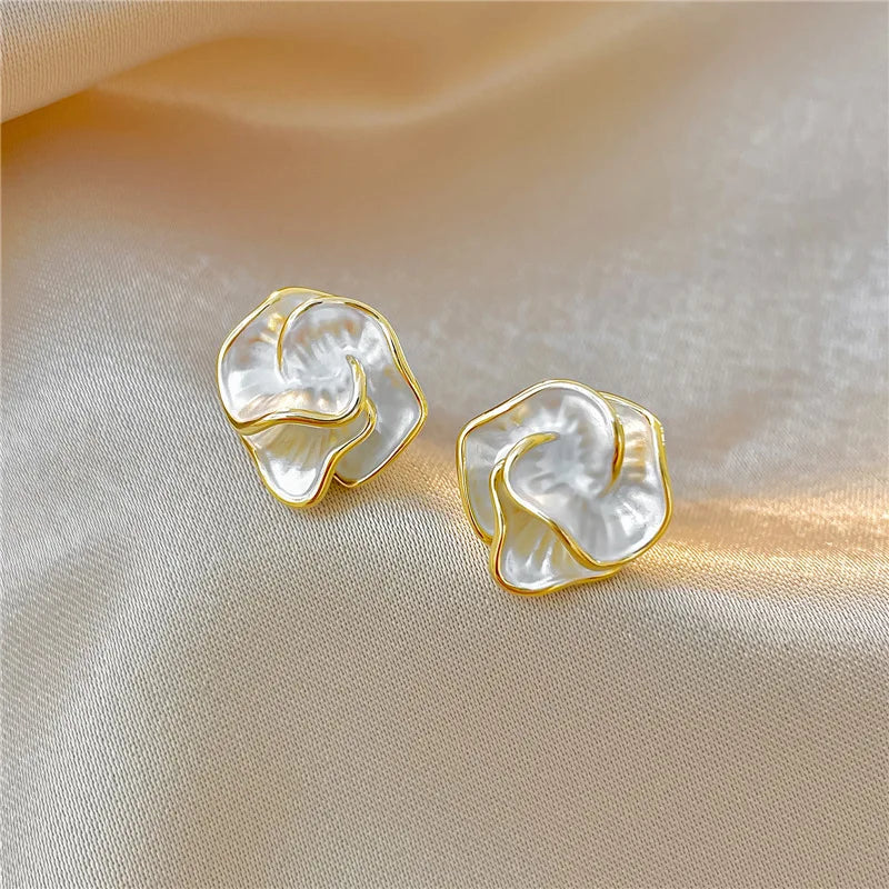 Model wearing the pearl flower stud earrings
