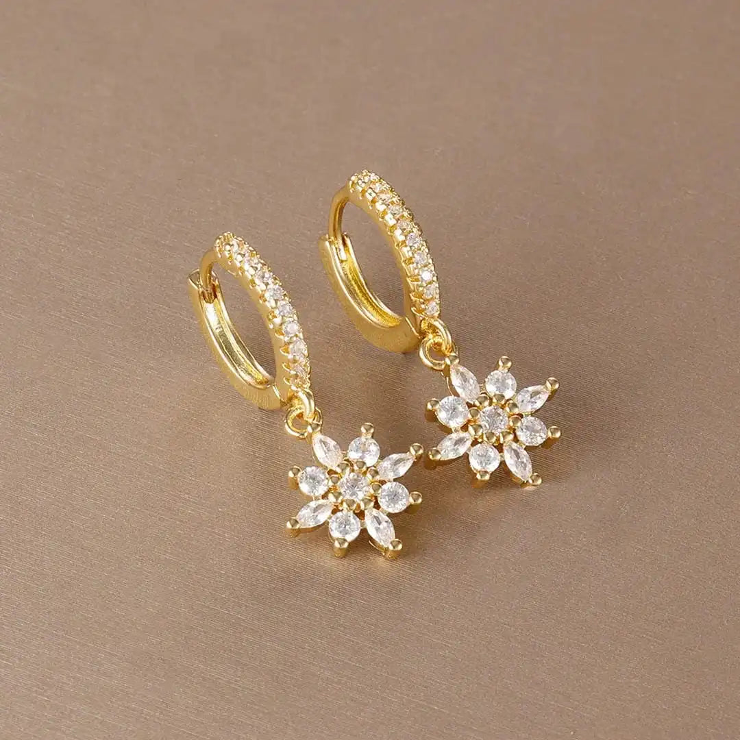 Main shot of the sparkling star dangle earrings