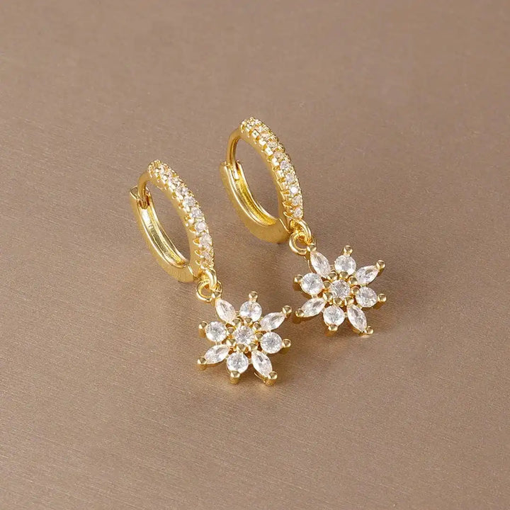 Main shot of the sparkling star dangle earrings