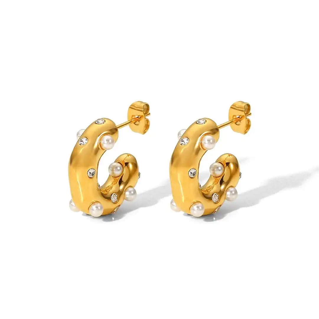 Both earrings displayed together on a jewellery tray