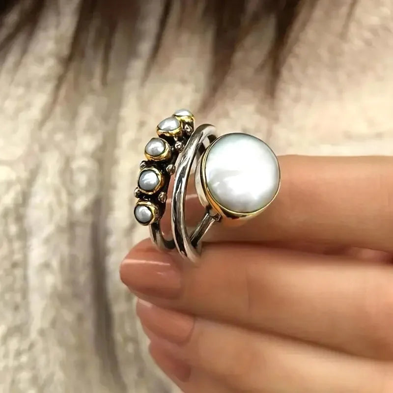 Close-up of the pearl detailing on one stacking ring