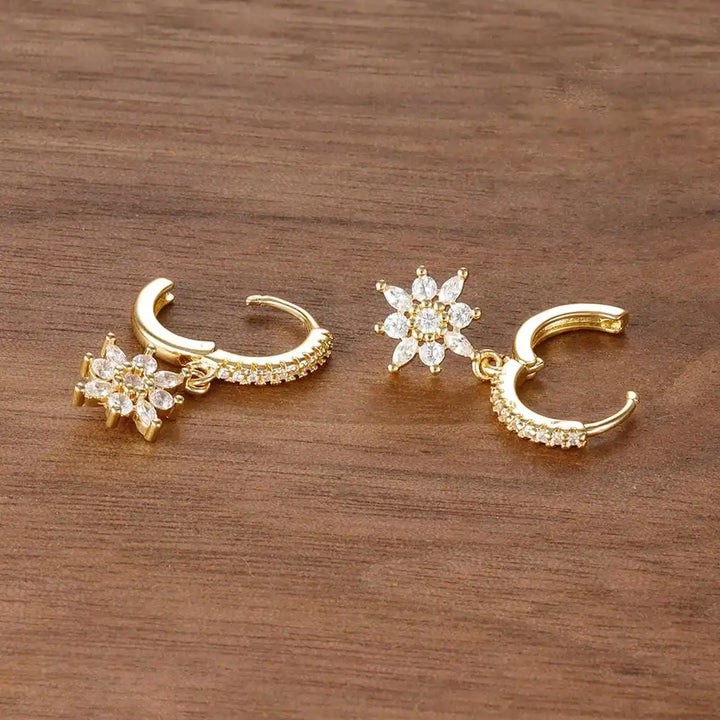 Both earrings displayed together on a jewellery tray