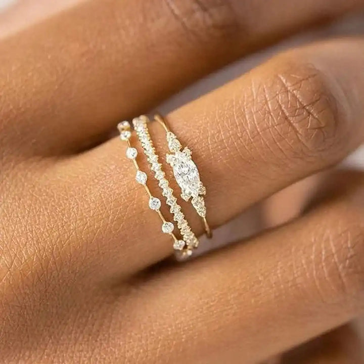 Main shot of the dainty gold midi ring set