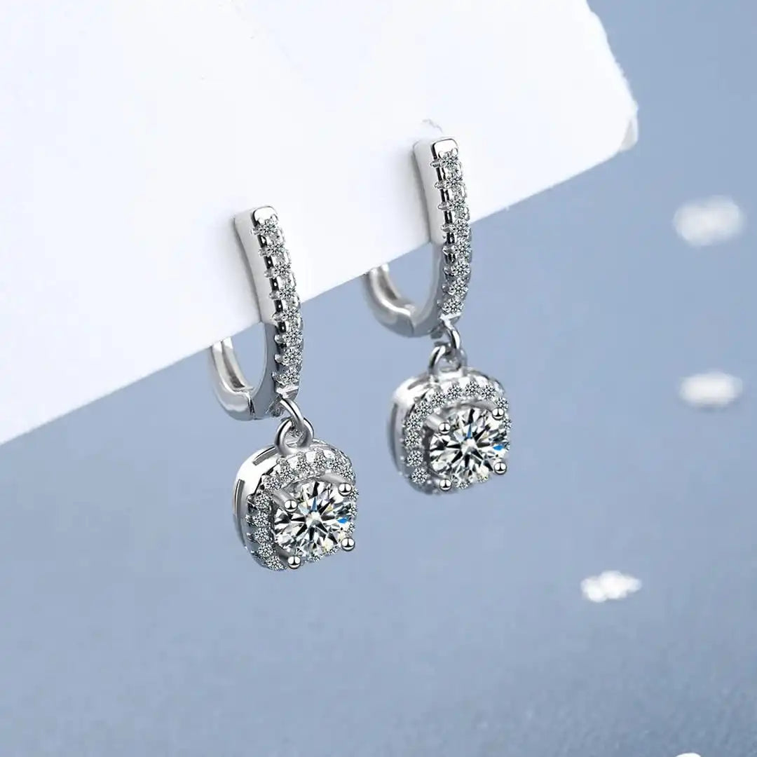 Main shot of the moissanite huggie hoop earrings