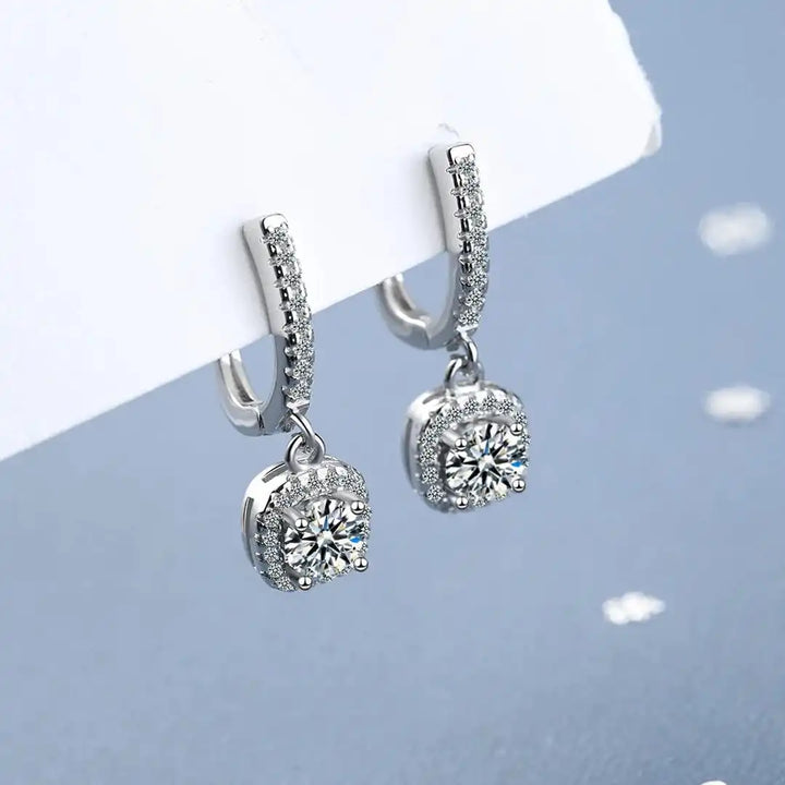 Main shot of the moissanite huggie hoop earrings