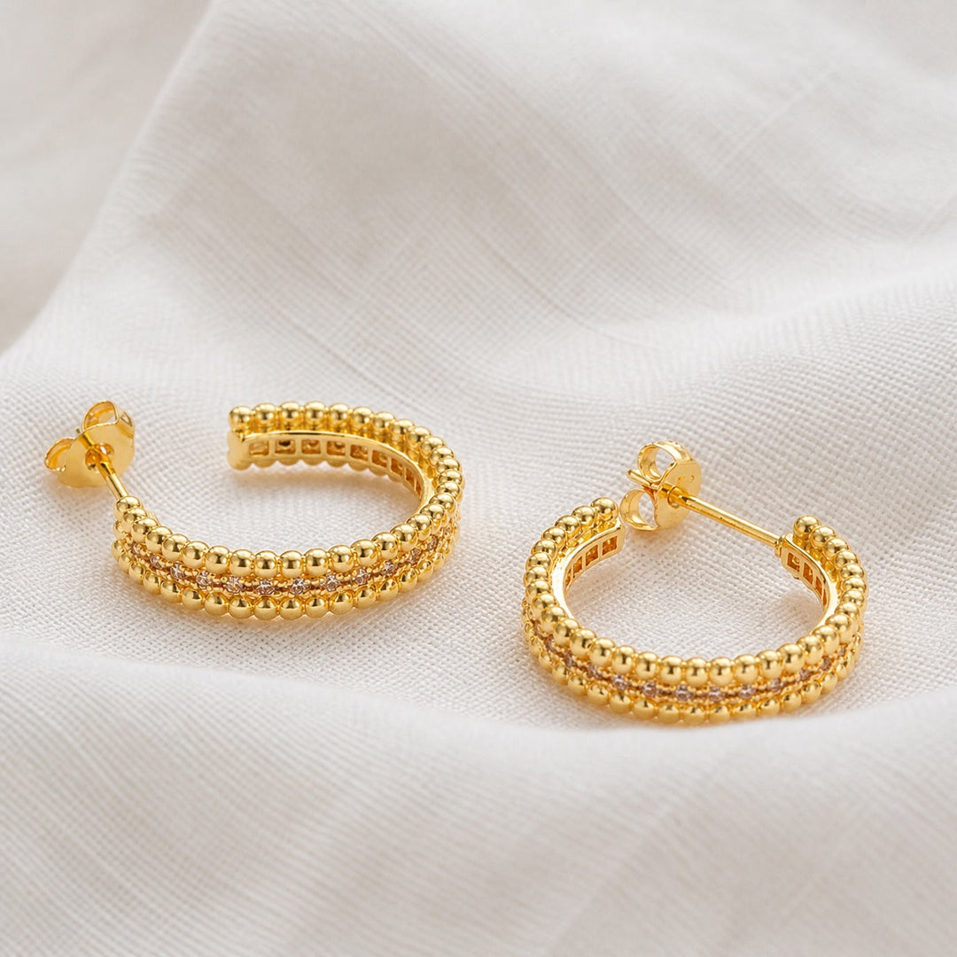 Main shot of the studded crystal hoop earrings