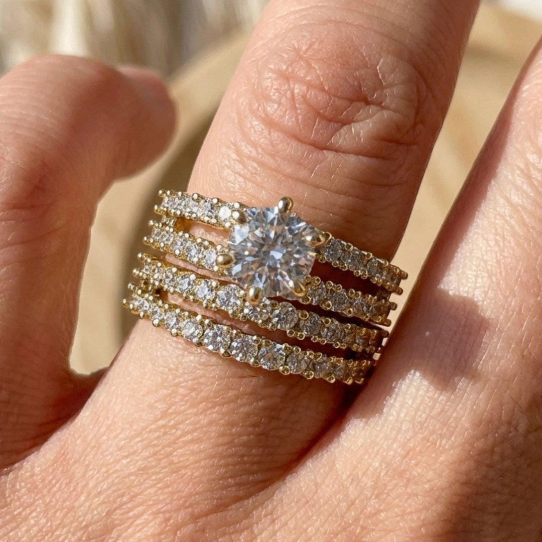 Set worn stacked on a model's hand