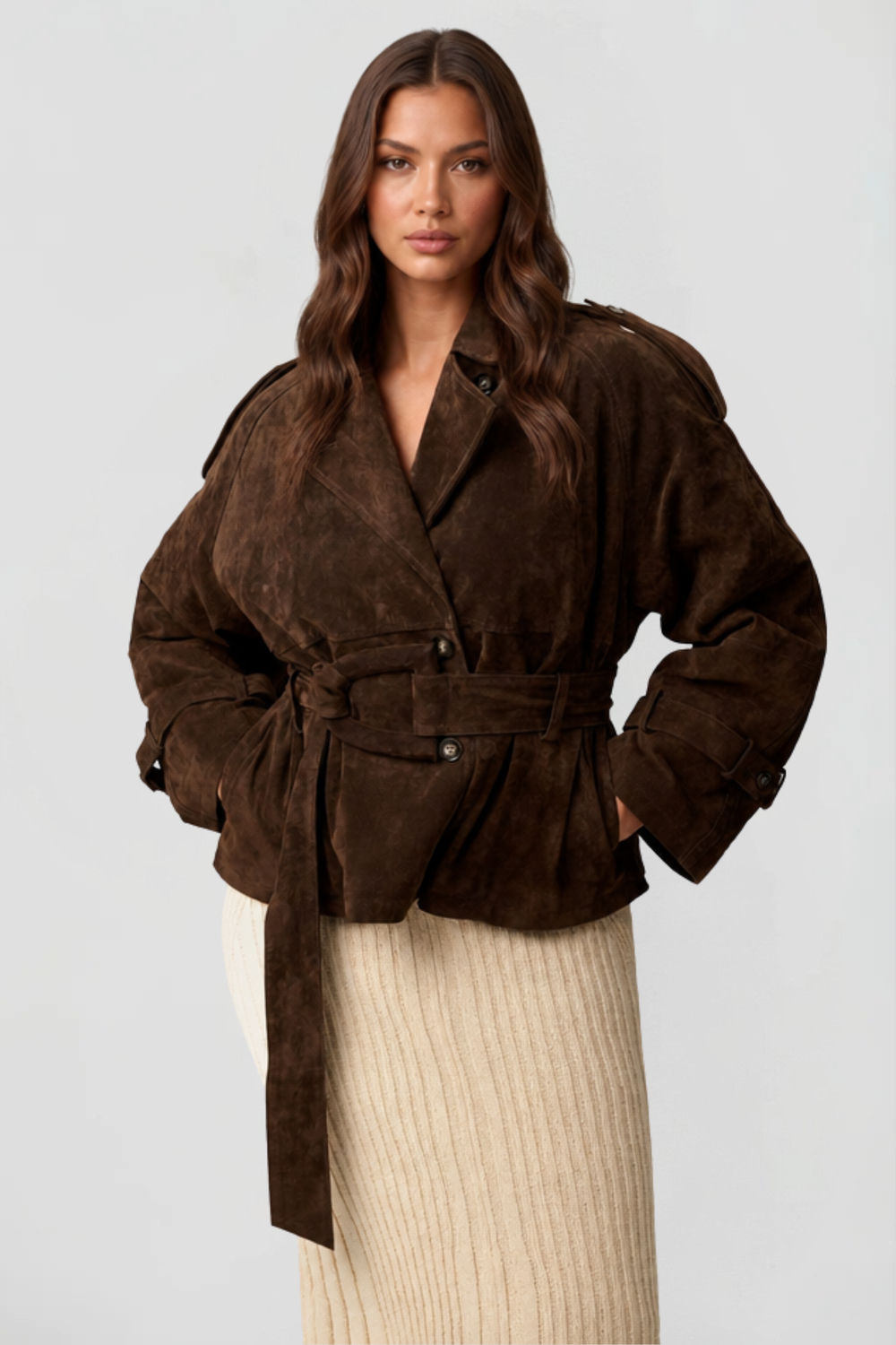 Chocolate brown suede belted jacket with wide lapels, close front view on model