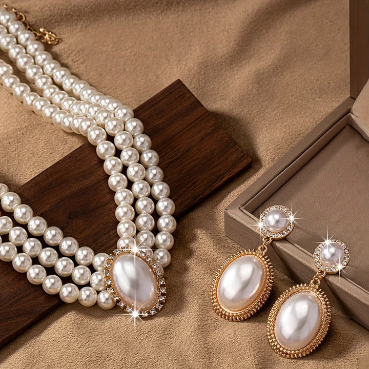 Pearl strand jewelry set with necklace, bracelet and earrings