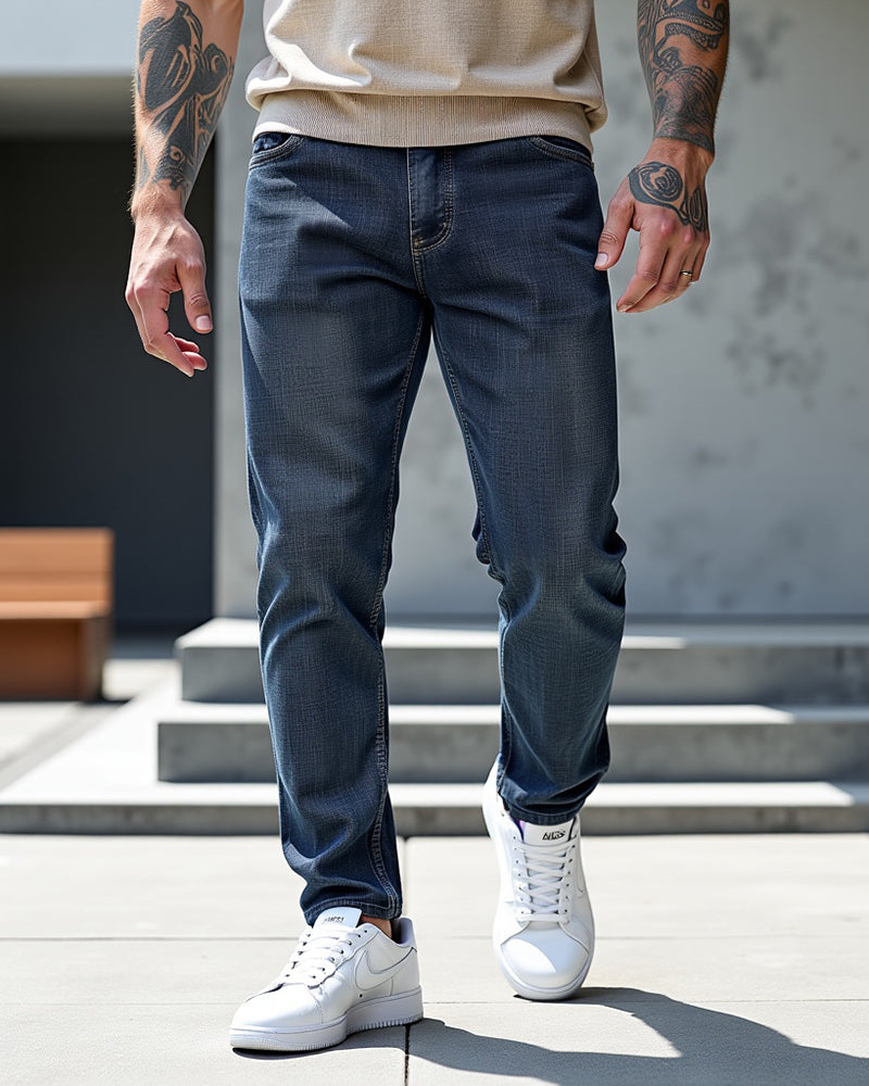 Avenue slim fit jeans in dark blue, styled outdoors